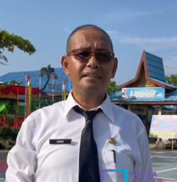 Azman, Guru SMKN 2 Tembilahan yang menerima SK PPPK. (istimewa)