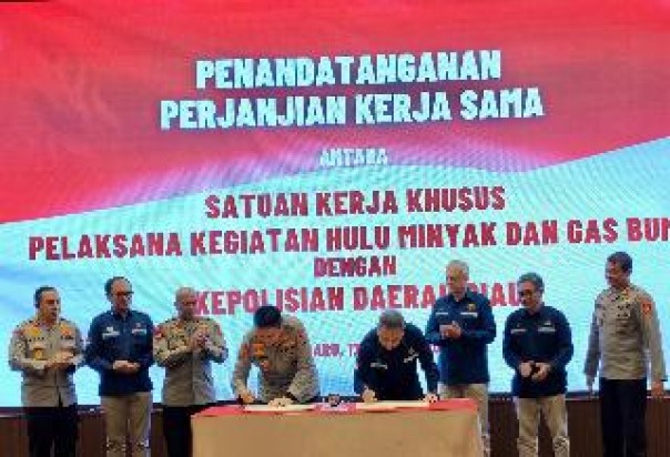 Penandatanganan PKS SKK Migas - Polda Riau, kemarin di Pekanbaru. (istimewa)